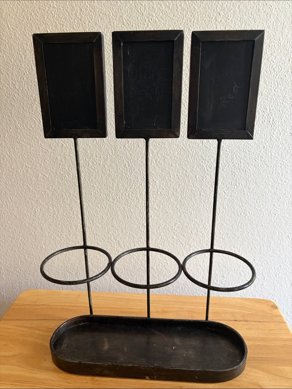 Rustic black metal wine bottle holder with chalkboards